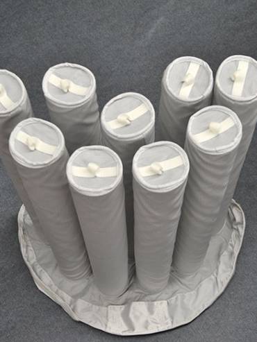 poche pieuvre pour système de filtration haute performance sur lit fluidisé, garantissant la récupération des particules tout en évitant la contamination lors de l’enrobage ou de la micronisation.